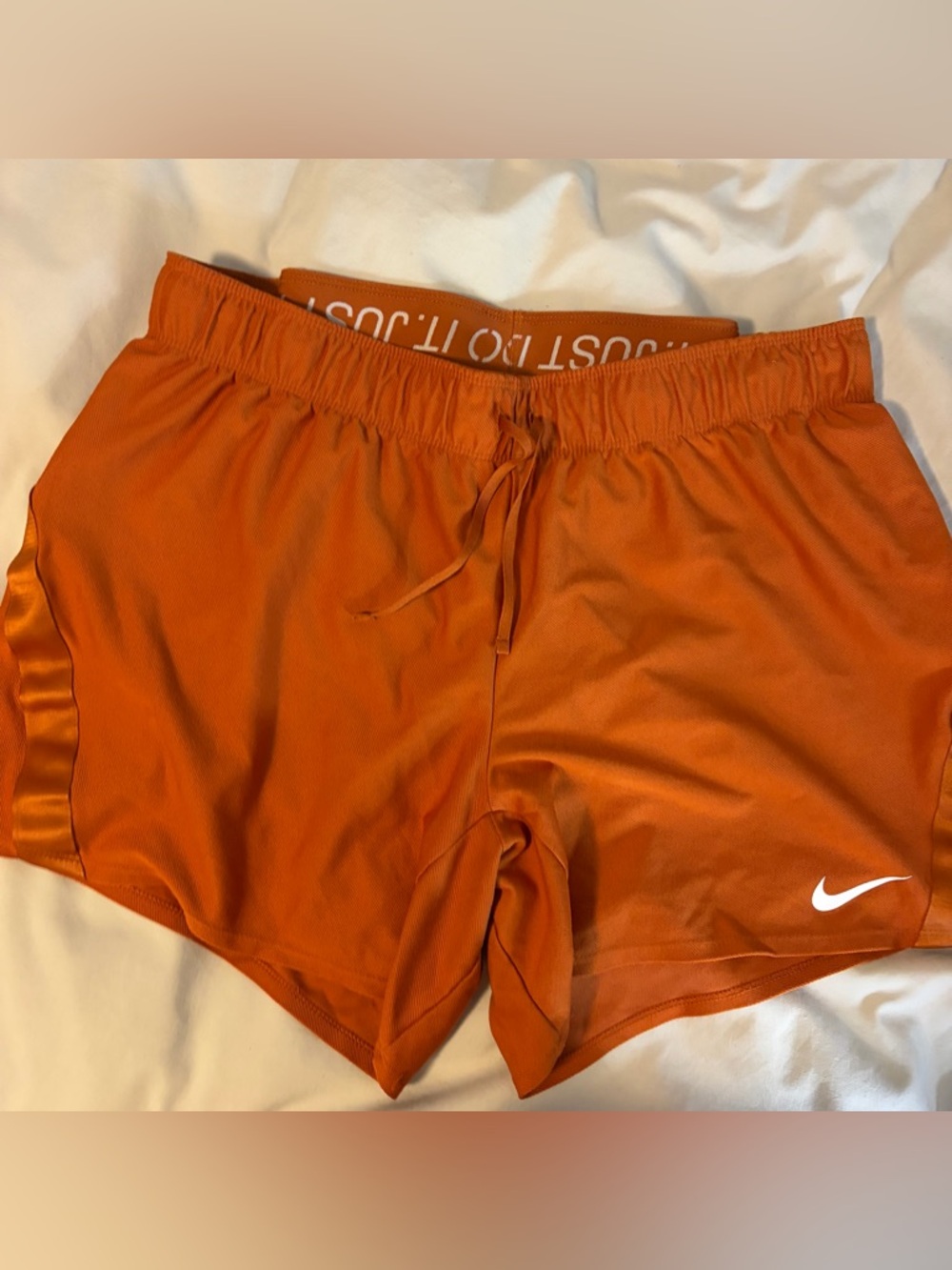 Nike Orange Dri-FIT Athletic Shorts with White Swoosh